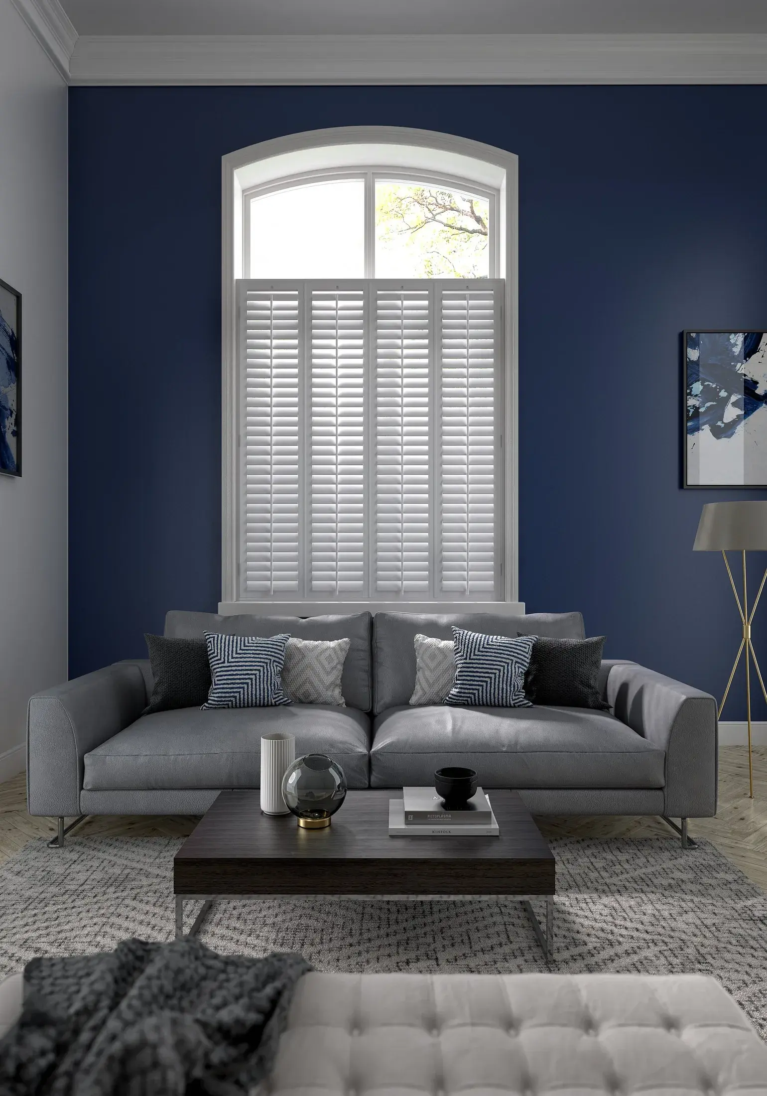 Café-style shutters fitted beneath an arched living-room window
